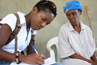 Zanmi Lasante nurse with patient.